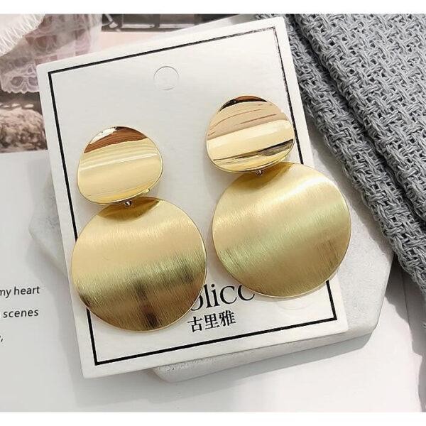 Eclat Newyork's Simple Round Earrings with a polished gold-tone finish.