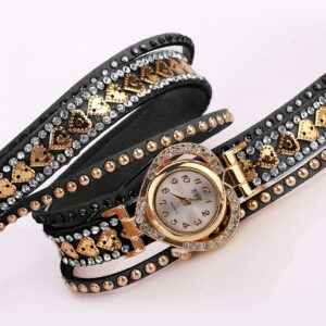 Eclat Newyork Heart-shaped bracelet watch with a black wraparound strap, an attractive gold-detailed watch face, and rhinestone and golden heart embellishments.