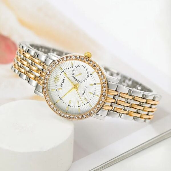 Eclat Newyork Women's Quartz Watch with a two-tone stainless steel strap and rhinestone embellishments, suitable for business and casual wear.