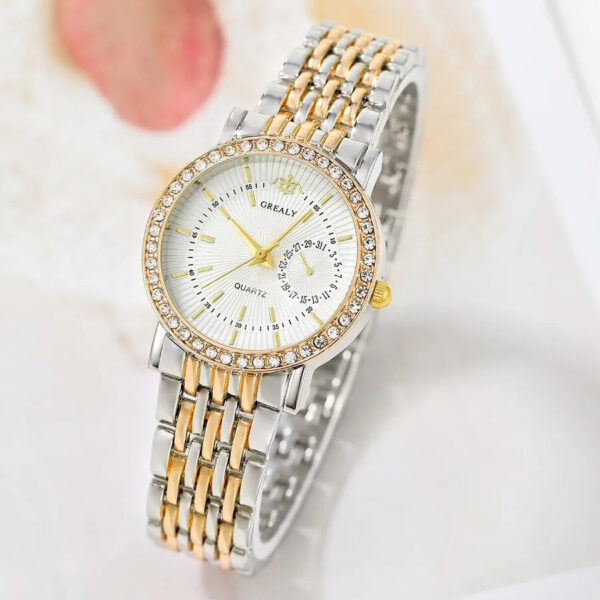 Eclat Newyork Women's Quartz Watch with a two-tone stainless steel strap and rhinestone embellishments, suitable for business and casual wear.