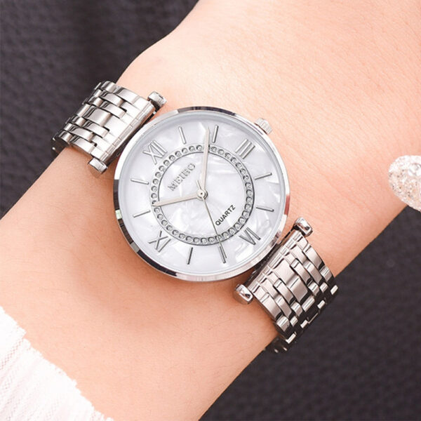 Eclat Newyork Women's Casual Watch with alloy steel strap, diamond-embedded design, and simple Roman numeral face.