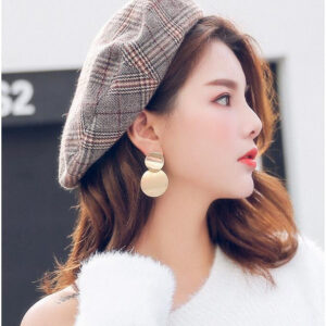 Eclat Newyork's Simple Round Earrings with a polished gold-tone finish.